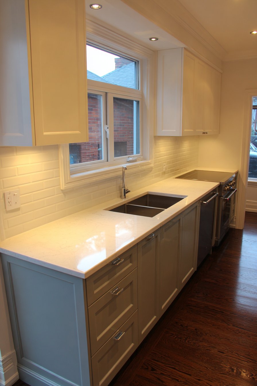 Sleek Two-Tone Cabinetry Excellence