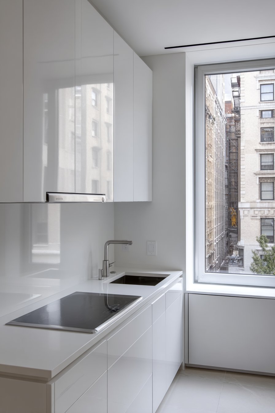 The Seamless Sanctuary: Handleless White Kitchen Perfection