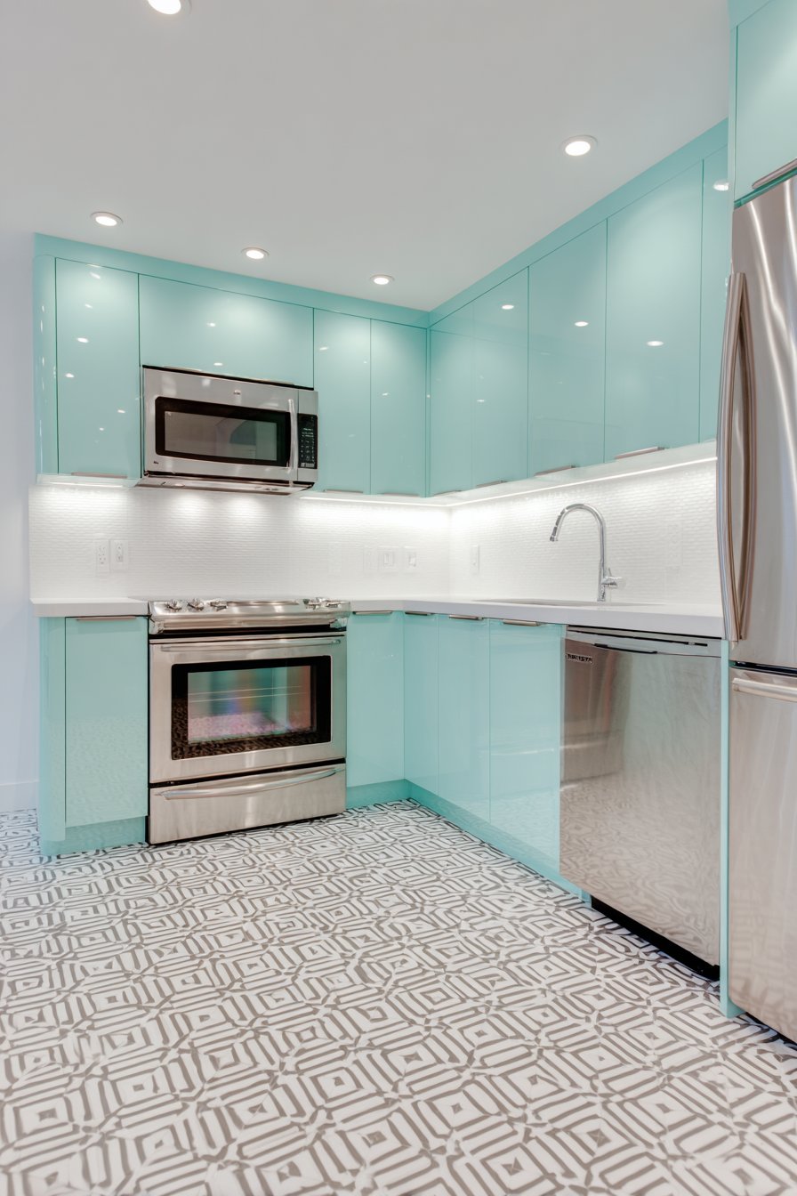 Sleek Modern Mint Green Kitchen with Contemporary Edge