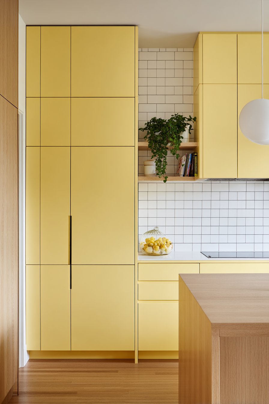 Scandinavian-Inspired Kitchen with Pale Lemon Yellow Cabinets