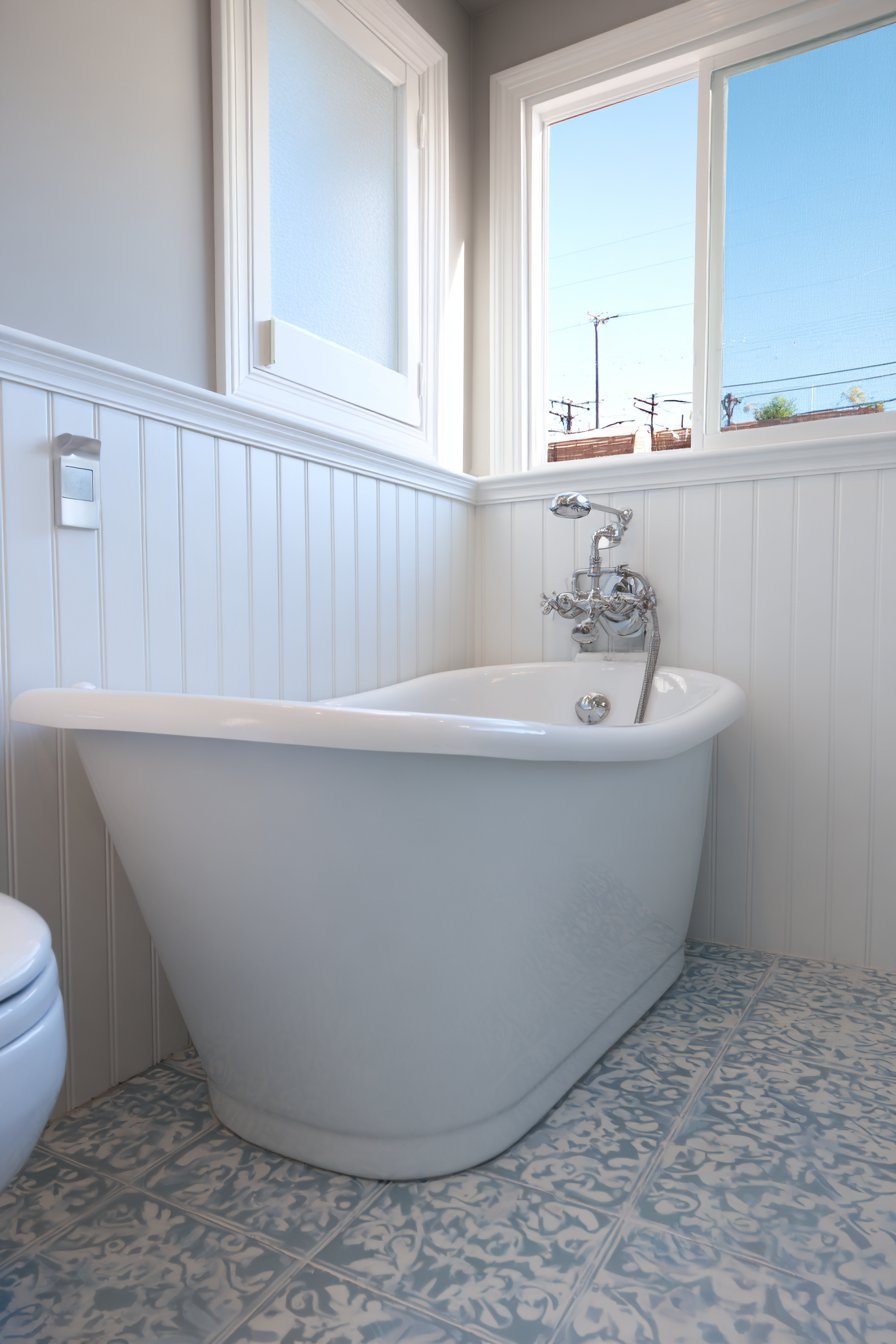 Vintage-Inspired Corner Sink with Freestanding Tub