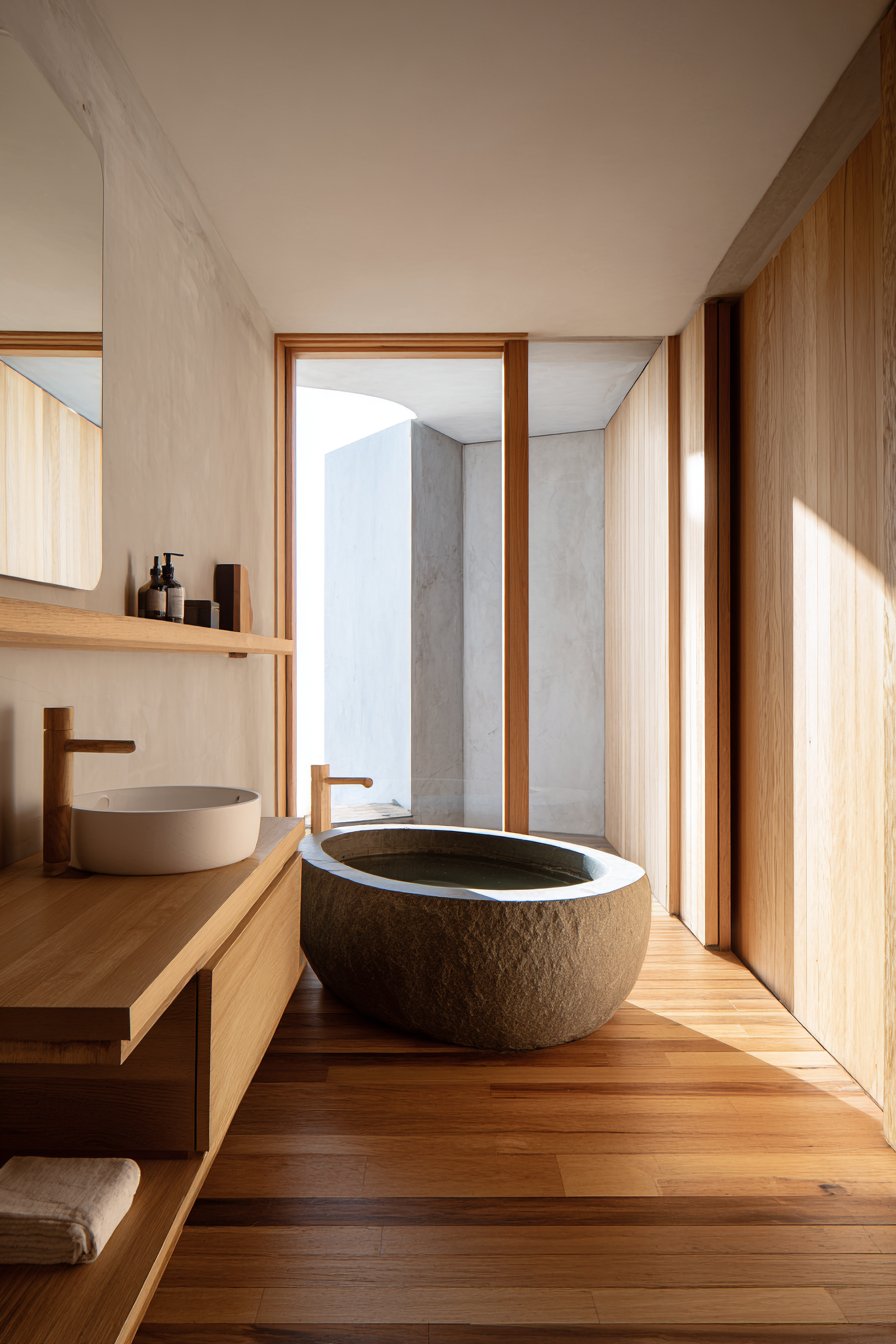 Serene Soaking Sanctuary with Natural Stone Tub