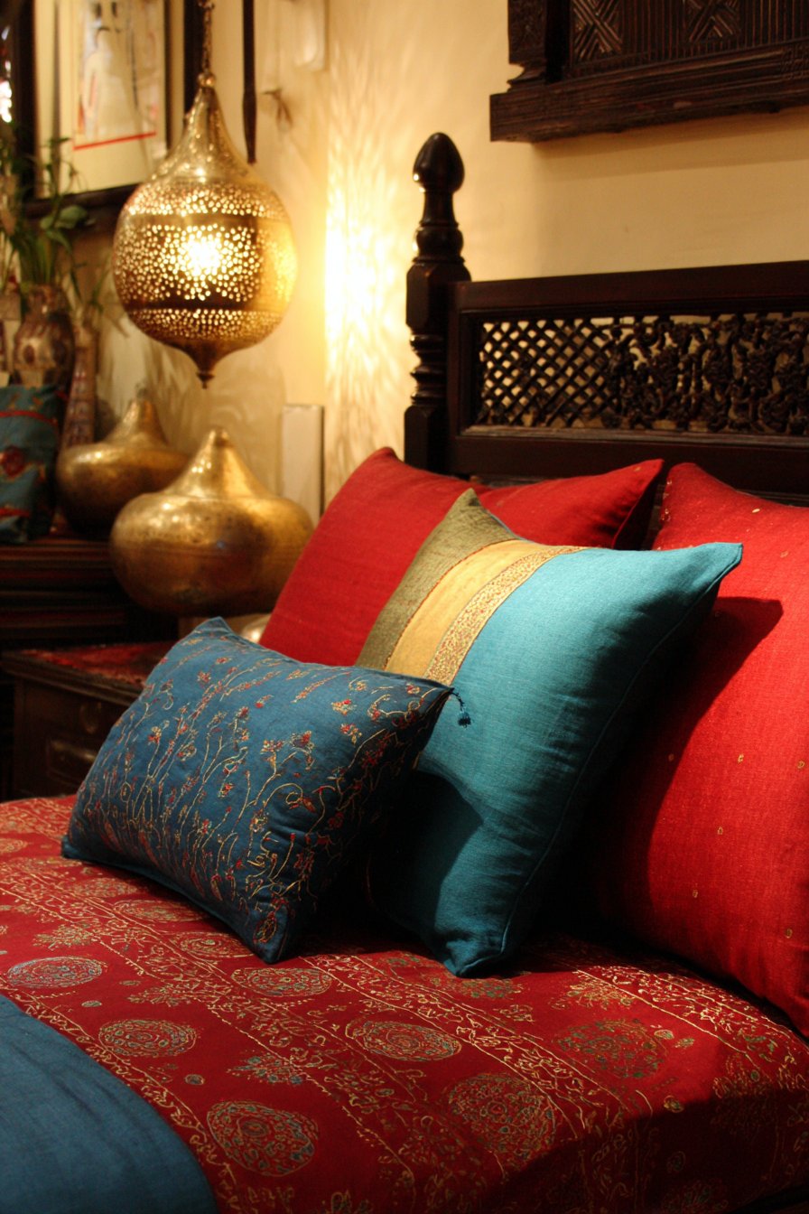 Carved Elegance with Jewel-Toned Textiles