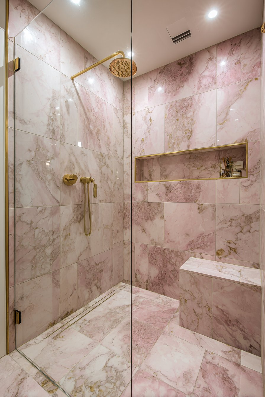 Luxurious Marble-Look Shower with Sage Accents