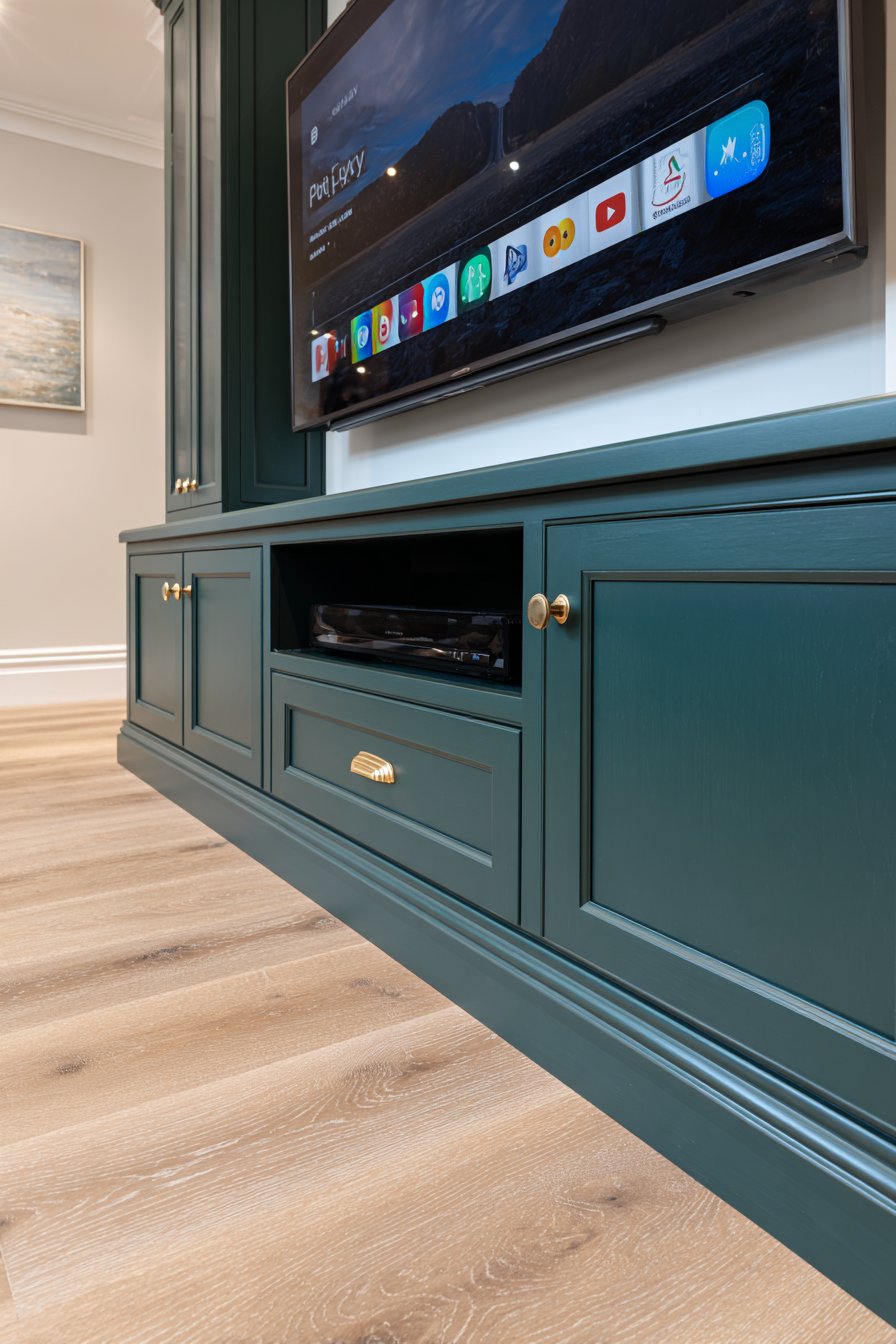 Modern Entertainment Center with Matte Green Cabinetry