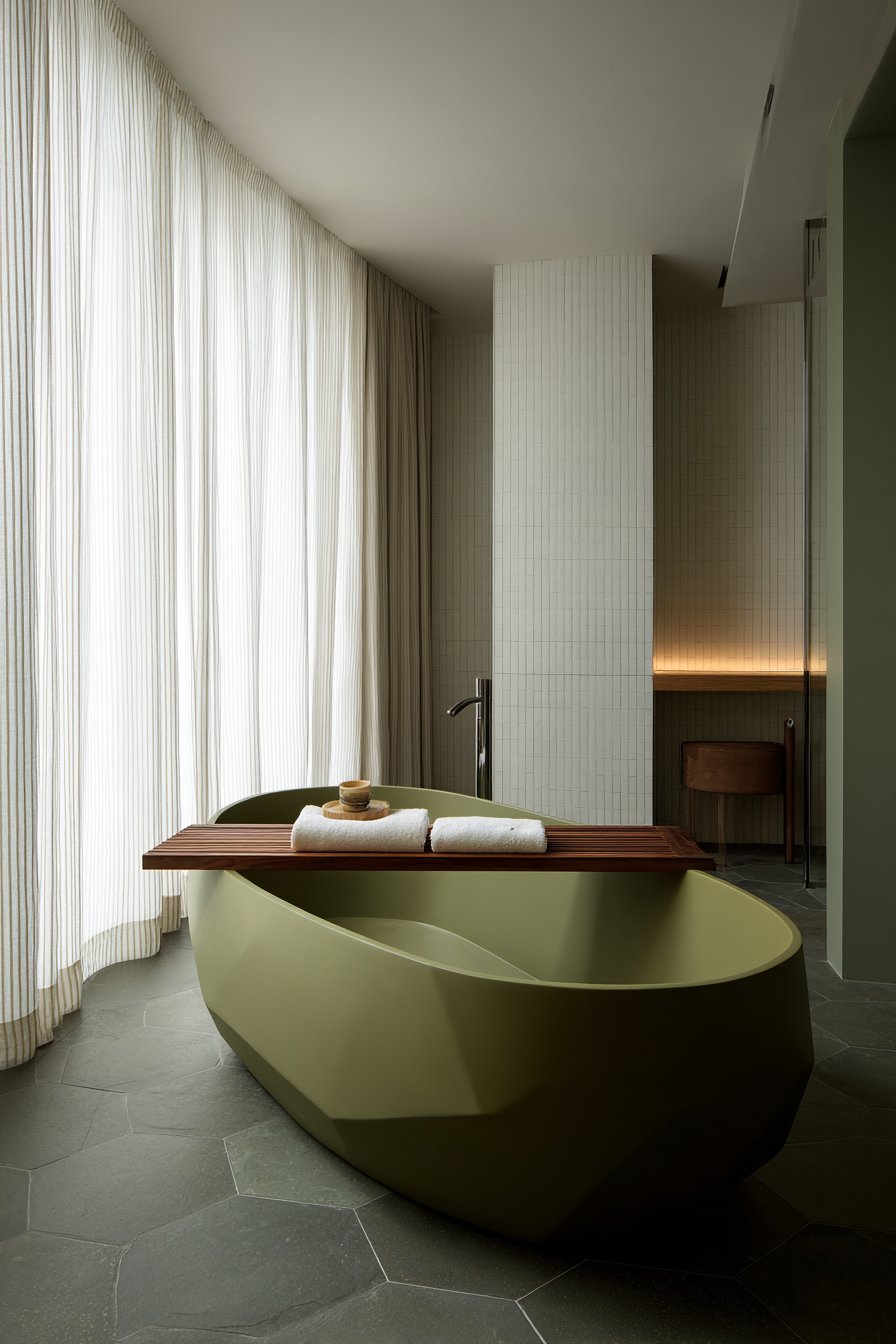 Elegant Freestanding Tub on Olive Green Floor Tiles
