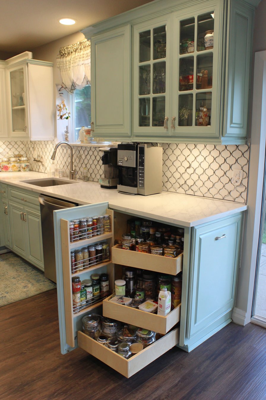 Corner Sink Innovation in Pale Mint Green with Hidden Storage