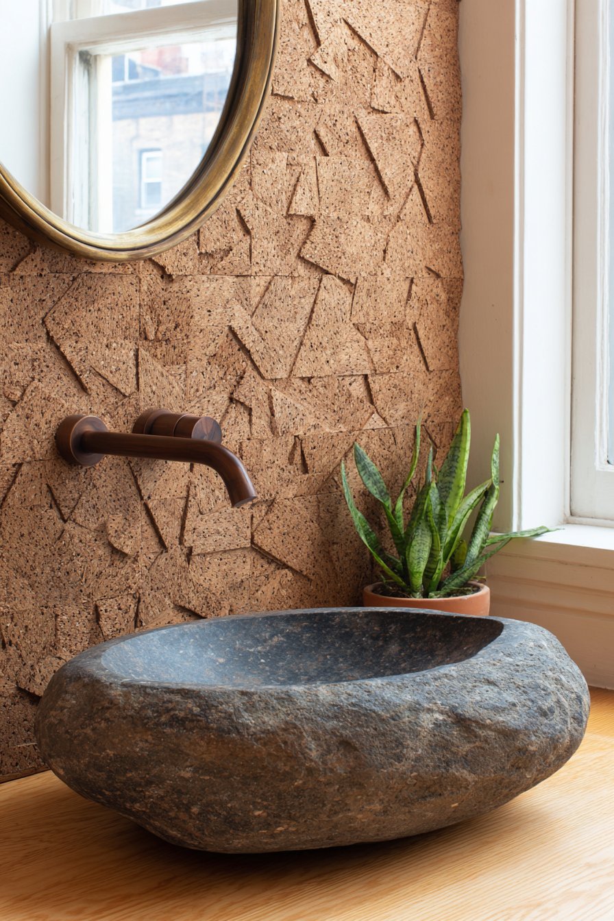 River Stone Vessel Sink with Three-Dimensional Cork Tiles