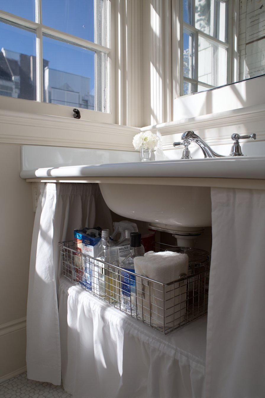Pull-Out Organizers Beneath Pedestal Sinks