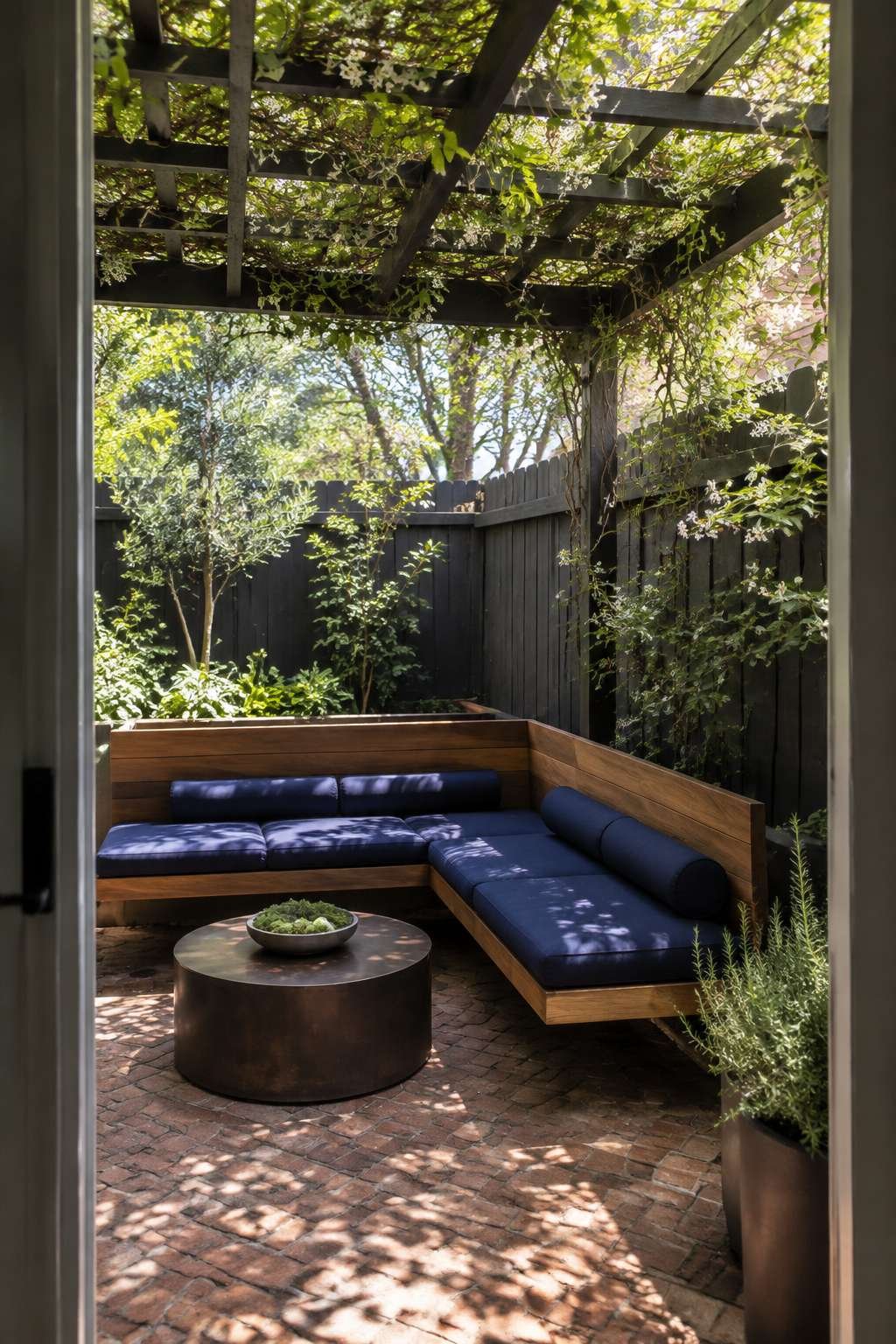 Built-In Banquette Seating Under a Jasmine-Covered Pergola